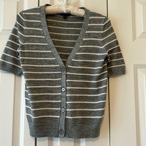 A short sleeved cardigan with Shimmers in beige stripes